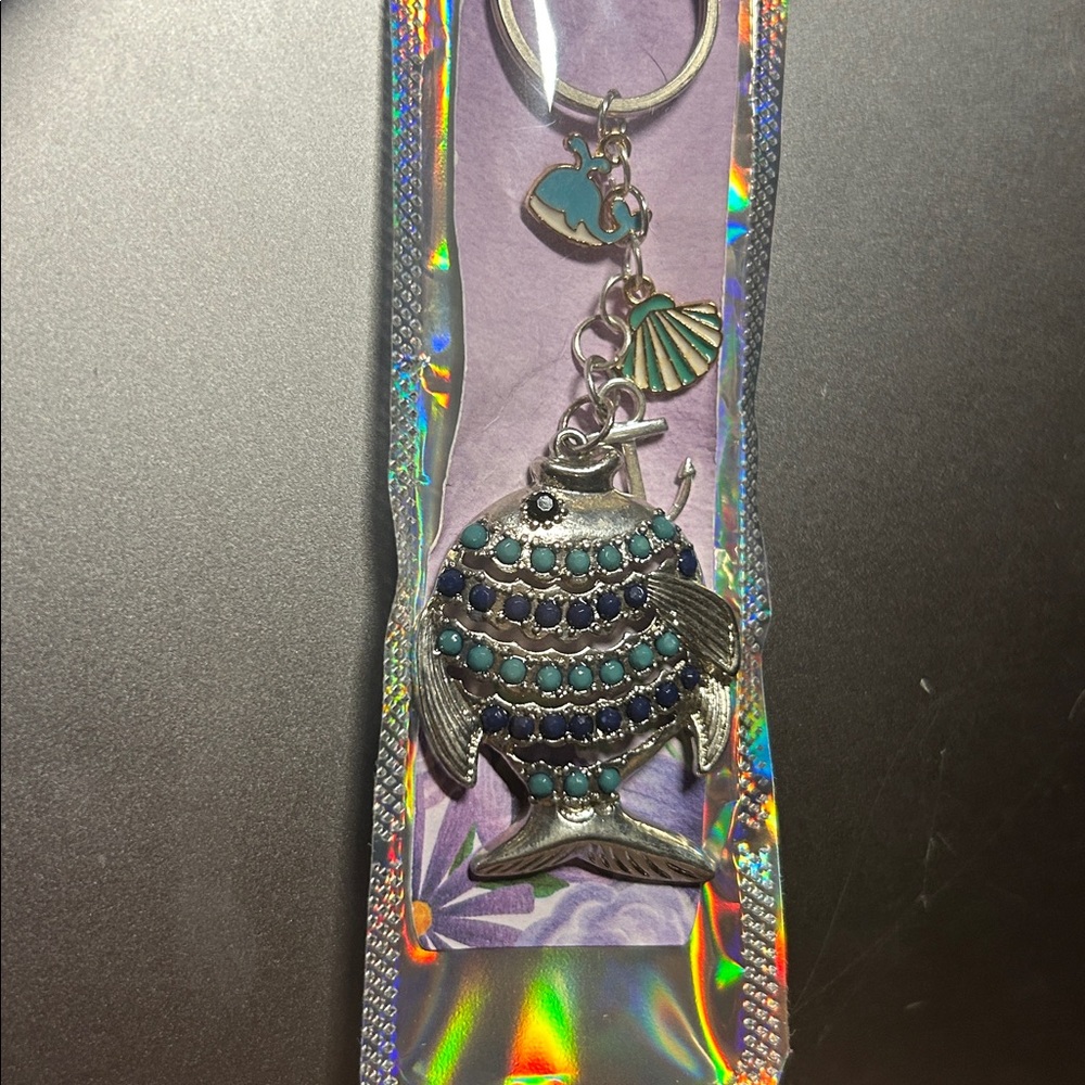 Silver keychain with Fish theme charms